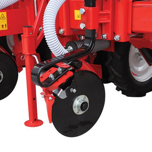 Disc fertilizer leg